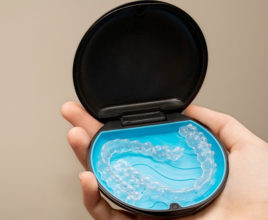 Transparent aligners in a storage case